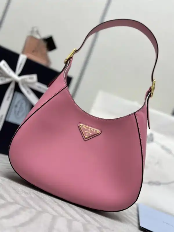 Discover the elegance of the Prada Cleo Medium in soft pink. A timeless piece that adds a touch of charm to any outfit. 💖✨👜 https://tinyurl.com/28qt464q