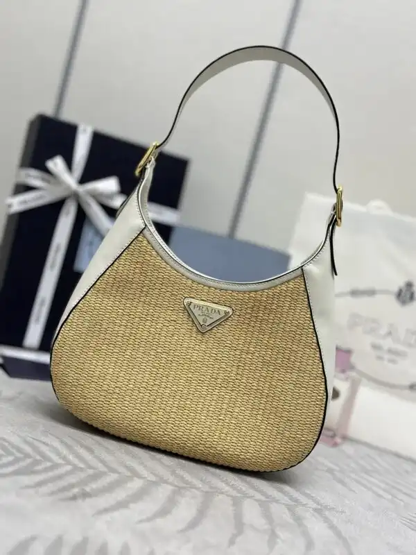 Discover the elegance of the Prada Cleo New in soft white. Perfect for any occasion, it embodies timeless beauty. ✨💖👜 https://tinyurl.com/27nx7adb