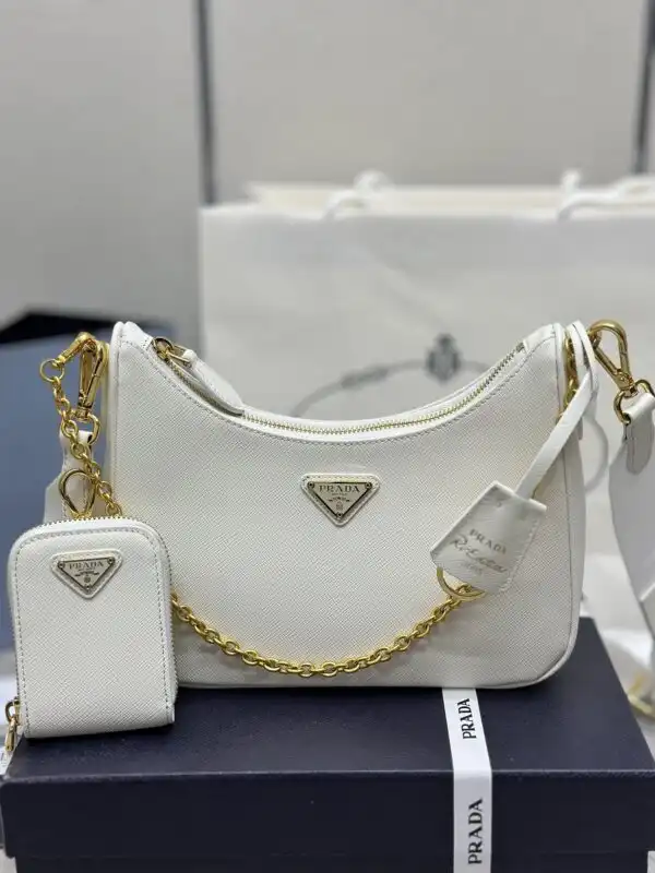 Introducing the Prada Re-Edition White 2005: a timeless, elegant piece that beautifully blends classic charm with modern style. ✨🤍👝 https://tinyurl.com/2bgbcwg5