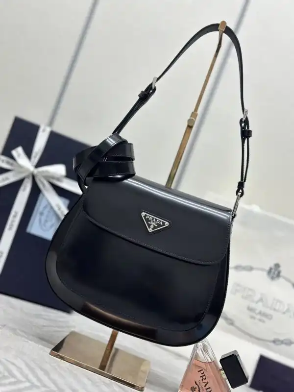 Discover the elegance of the Prada Cleo Black Bag with Flap. 🌟 A timeless accessory that adds charm to any outfit. 🖤✨ https://tinyurl.com/23m2qqox