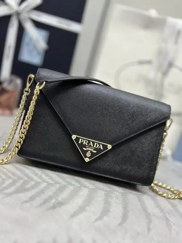 Discover the elegance of the Prada Saffiano Black Small Envelope. Perfect for every occasion, it adds a touch of luxury to your day. 🖤✨💼 https://tinyurl.com/25m3qmg9