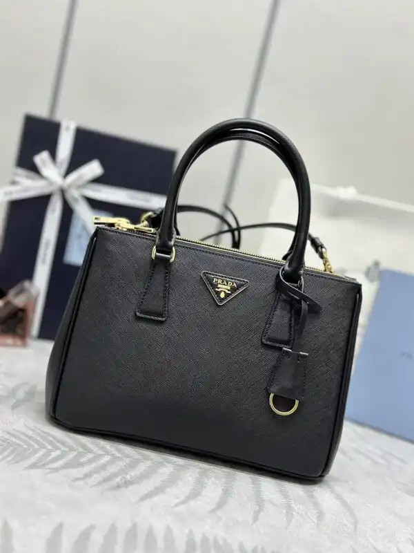 Discover the timeless elegance of the Prada Galleria in classic black. A perfect companion for your stylish journey. ✨👜💖 https://tinyurl.com/2blo3cma