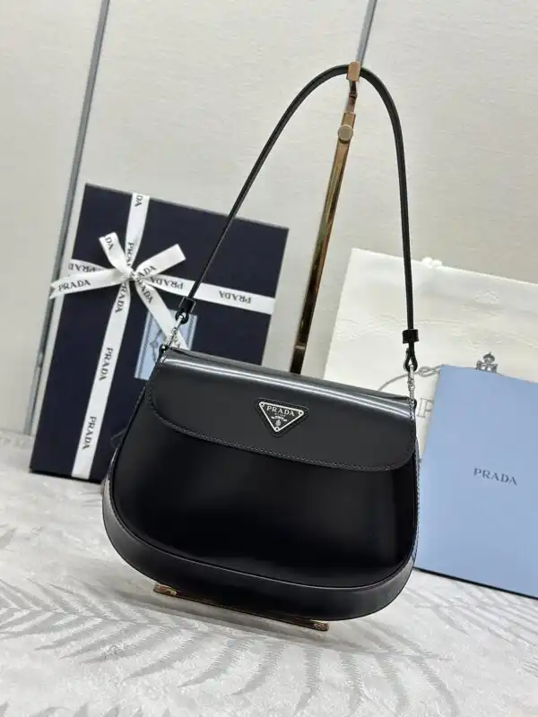 Discover elegance with the Prada Cleo Small Black Flap. A timeless accessory that complements your style beautifully. 💖✨👜 https://tinyurl.com/22npcdhb