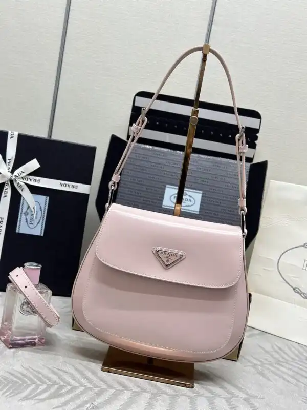 Discover elegance with the Prada Cleo Pink Bag. 🌸 Its charming flap design adds a touch of sophistication to any outfit. 💖✨ https://tinyurl.com/29sq5us9