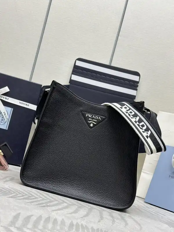 Discover timeless elegance with the Prada Saffiano Tote in classic black. Perfect for any occasion, it brings style and grace. 🖤✨👜 https://tinyurl.com/2an4bn4s