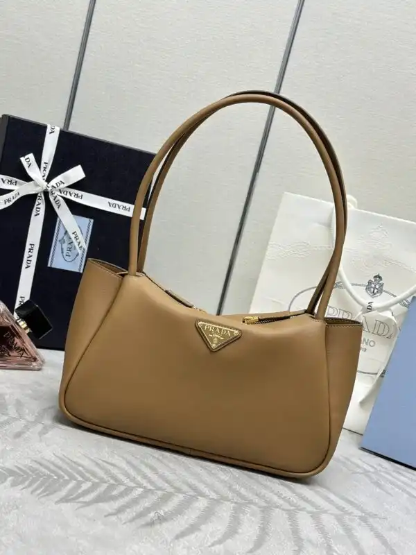 Discover elegance with the Prada Medium Caramel Shoulder Bag. Perfect for any occasion, it adds a touch of warmth to your style. 👜✨🍂 https://tinyurl.com/29excn58
