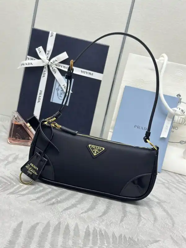 Discover timeless elegance with the Prada Re-Edition 2002 Nylon. A perfect blend of style and nostalgia, just for you! ✨💖👜 https://tinyurl.com/24shp5l3
