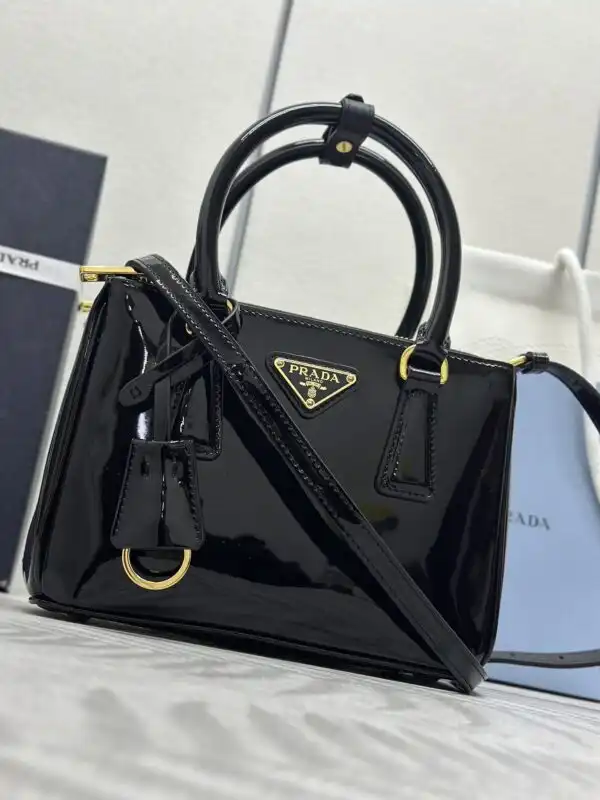 Discover the elegance of the Prada Galleria in stunning black patent. Perfect for elevating any outfit with grace and style. ✨👜❤️ https://tinyurl.com/2bn5mv92