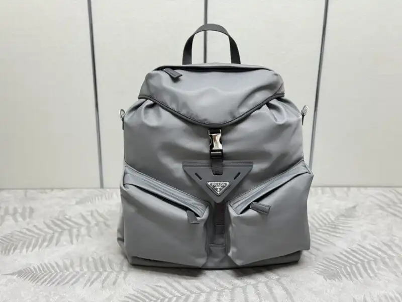 Discover the elegance of the Prada Re-Nylon Grey Backpack 🌟, a perfect blend of style and sustainability. Carry your essentials with love! 💖🎒 https://tinyurl.com/28nmlplf