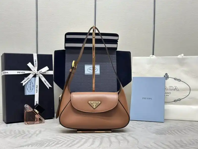 Discover the elegance of the Prada Small Shoulder Bag in Caramel, a perfect companion for your daily adventures. 🍂💖✨ https://tinyurl.com/252sl7dr