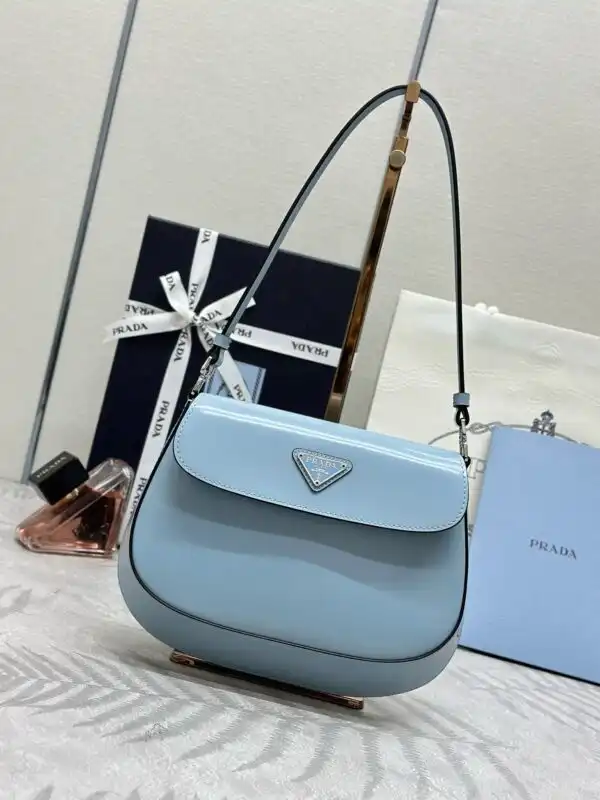 Discover elegance with the Prada Cleo Medium Blue Bag. Its charming flap design adds a touch of sophistication to any outfit. 💙✨👜 https://tinyurl.com/296smtho