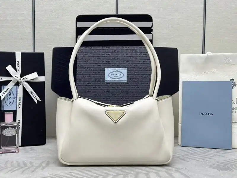 Introducing the elegant Prada Medium White Shoulder Bag—a perfect blend of style and grace. Elevate your look effortlessly! ✨👜💖 https://tinyurl.com/25m24fl2