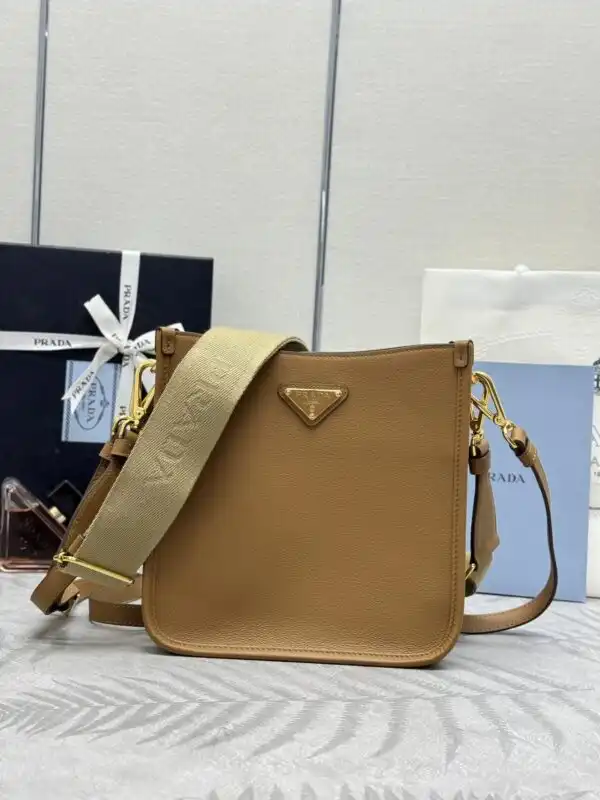 Discover elegance with the Prada Saffiano Small Tote in timeless black and brown. Perfect for every occasion! 👜✨❤️ https://tinyurl.com/2xjza62g