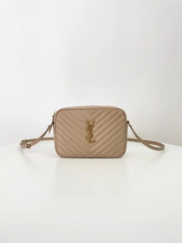 Discover the YSL Lou Camera Bag in soft apricot, a perfect blend of style and elegance. Elevate your everyday look! 🍑✨👜 https://tinyurl.com/24u3k6go