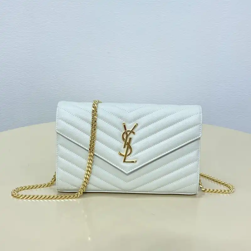 Elevate your style with the YSL Envelope Clutch in white. A timeless piece that adds elegance to any outfit! ✨👜💖 https://tinyurl.com/27ogyvf9