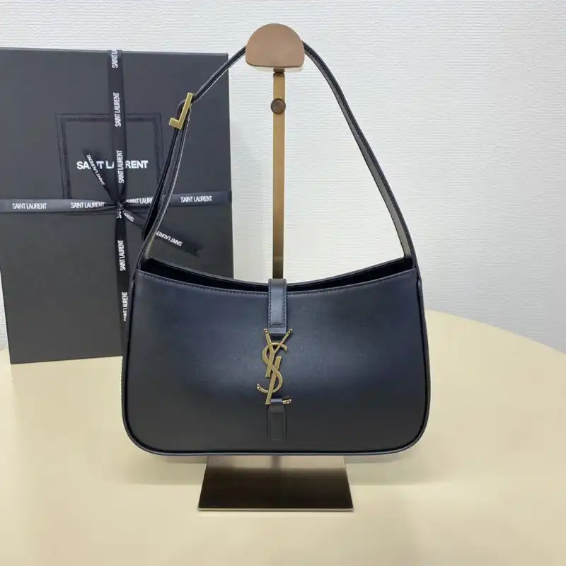 Discover elegance with the YSL LE 5 A 7 Hobo in classic black. Perfect for any occasion, it complements your style beautifully. 🖤✨🥰 https://tinyurl.com/29zzxlgl