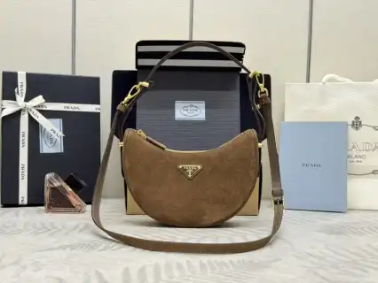 Discover the elegance of Prada Arque Suede. Soft textures and timeless style embrace your every step. 🌟💕✨ #LuxuryFashion https://tinyurl.com/26zrkftk