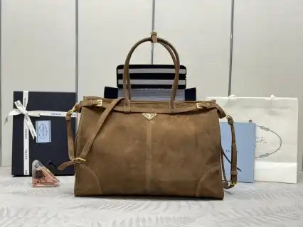 Discover the elegance of our Large Suede from Prada. Embrace timeless style and luxury with every touch. ✨💖👜 https://tinyurl.com/22cg25bn