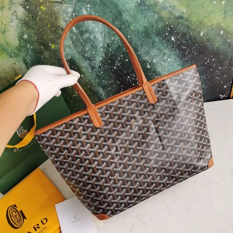Discover the elegance of the Goyard Artois PM in warm brown hues. A timeless companion for your daily adventures. 🌟✨👜 https://tinyurl.com/22ofysna