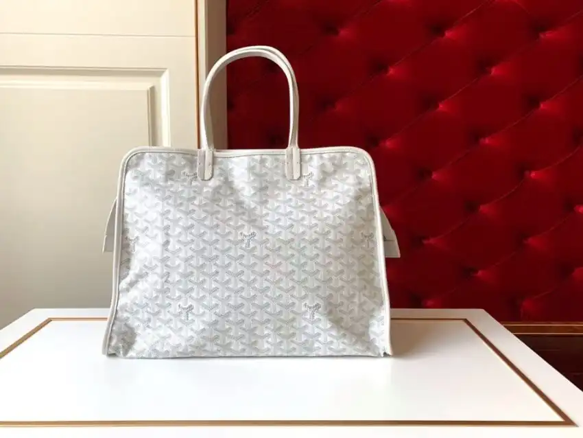 Discover the elegance of Goyard Hardy White ✨, a timeless piece that brings a touch of sophistication to your style. 🌸👜 https://tinyurl.com/2ybpzev3