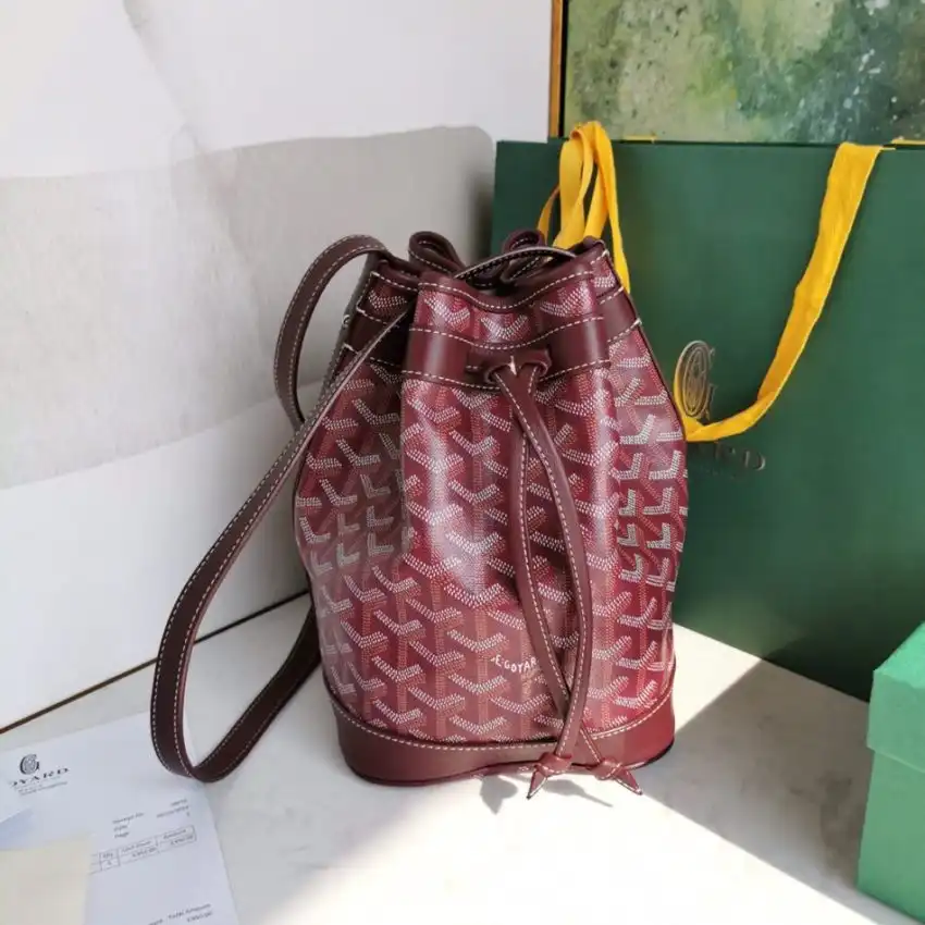 Discover the elegance of the Goyard Petit Flot Bucket in Bordeaux. A perfect blend of style and charm! 🍷✨👜 https://tinyurl.com/23y2qazb