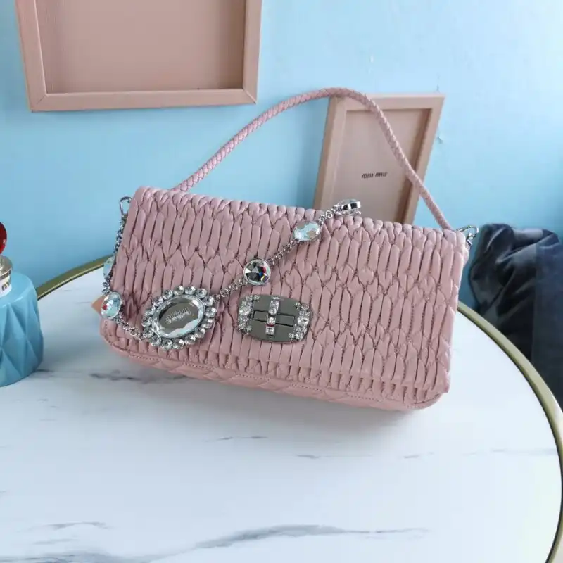 Elevate your style with the enchanting Miu Miu Crystal Handbag in soft pink. A touch of elegance for every occasion! ✨💖👜 https://tinyurl.com/27owr7w6