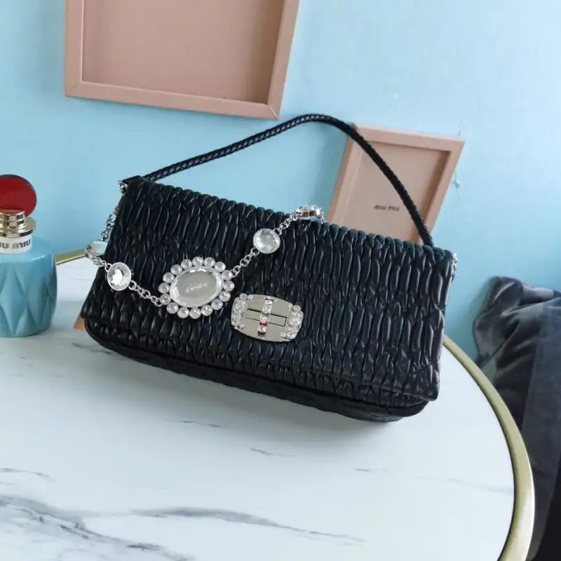 Elevate your style with the enchanting Miu Miu Crystal Handbag in black, a perfect blend of elegance and charm. ✨🖤💖 https://tinyurl.com/2d9n36mr