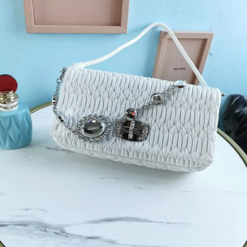 Elevate your style with the enchanting Miu Miu Crystal Handbag in white, a perfect blend of elegance and charm. ✨💖👜 https://tinyurl.com/2aaldmde
