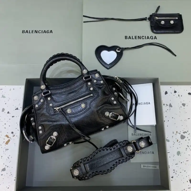 Discover the elegance of the Balenciaga Le City Black Diamond. A timeless piece that adds a touch of sophistication to any outfit. ✨🖤👜 https://tinyurl.com/25tv9g67