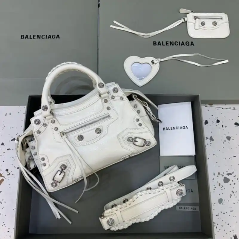 Discover the elegance of Balenciaga’s Le City White Diamond. A timeless piece that adds a touch of luxury to any outfit. ✨❤️👜 https://tinyurl.com/23goh5dp