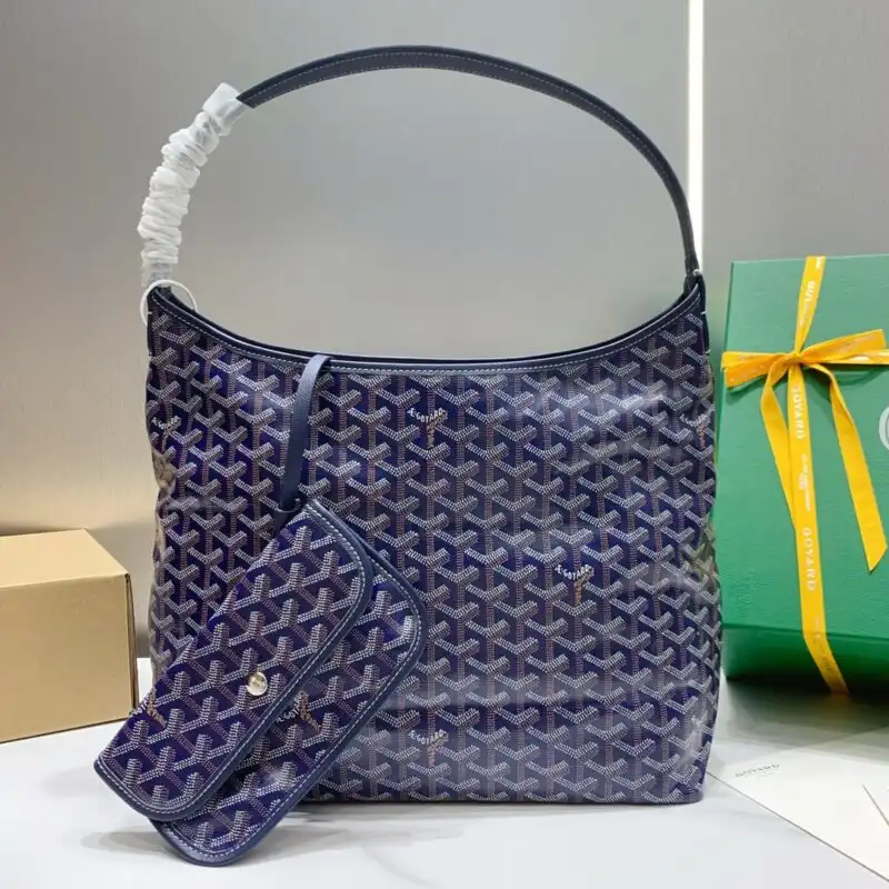Discover the elegance of Goyard Boheme in Dark Blue. A timeless companion, perfect for adding charm to your style! 💙✨👜 https://tinyurl.com/22e9xq9b