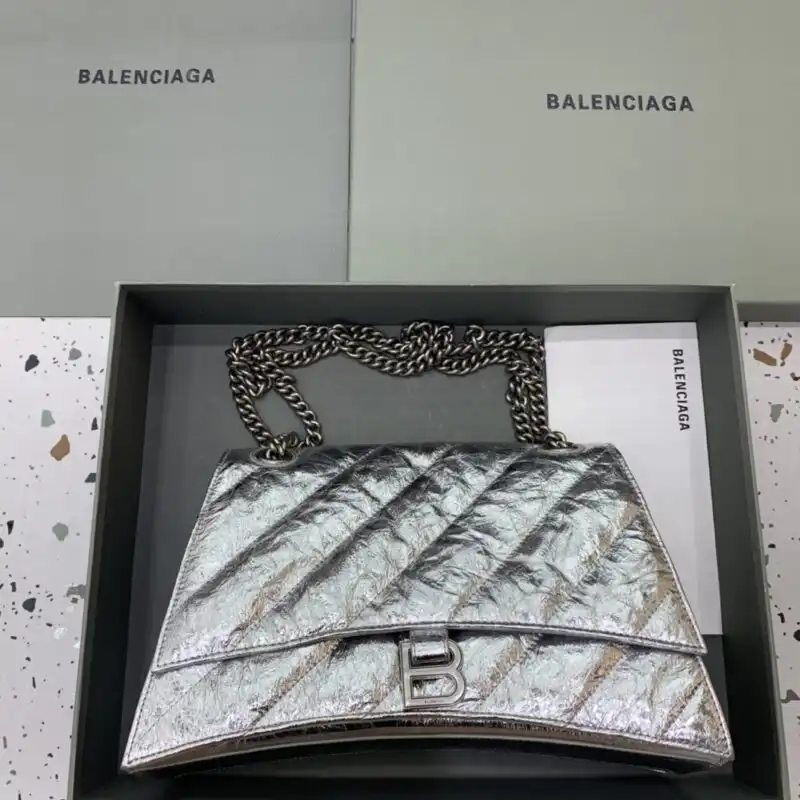 Discover the elegance of the Balenciaga Crush Large Silver 🌟, a perfect blend of style and sophistication for your wardrobe. 💖✨ https://tinyurl.com/2xm7q2gu