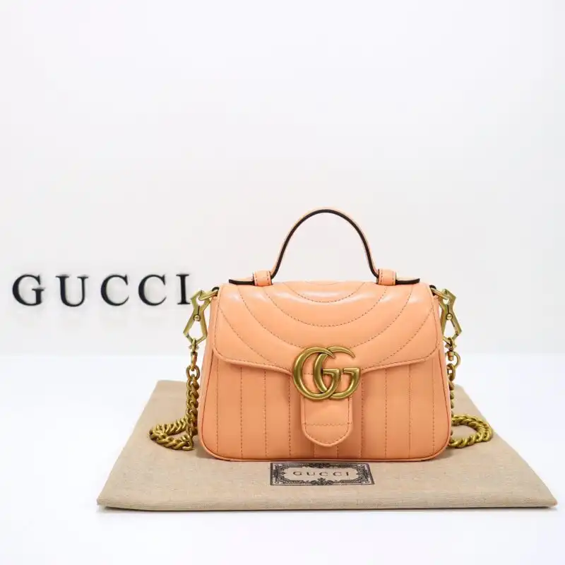 Embrace elegance with the Gucci GG Marmont Top Handle in Apricot 🍑✨ A timeless piece that adds a touch of warmth to any outfit. 💖 https://tinyurl.com/296yrtfg