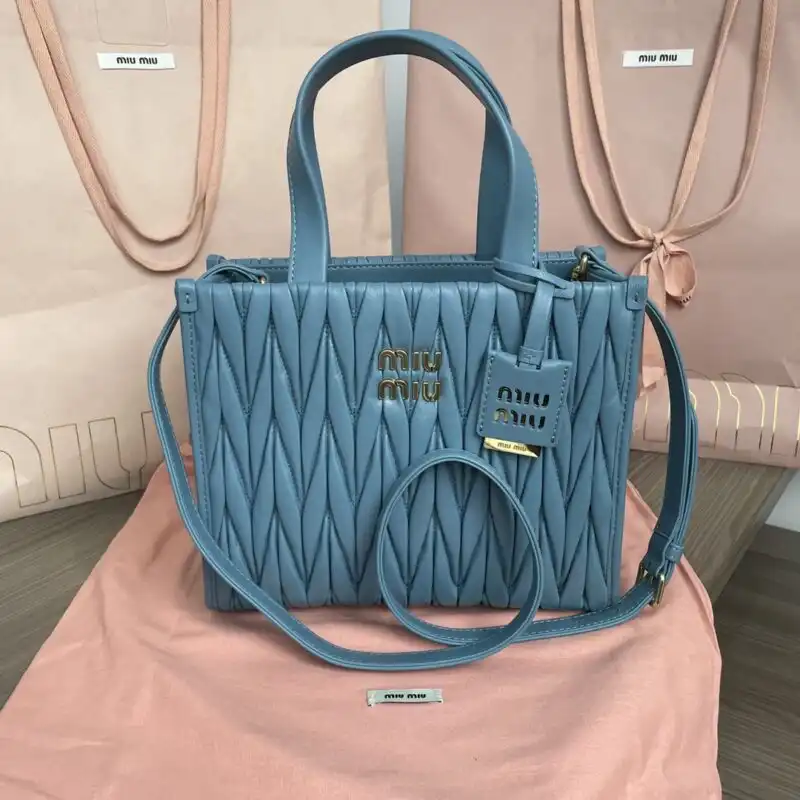 Discover the elegance of the Miu Miu Matelassé Tote in soothing blue. A perfect companion to brighten your day! 💖👜✨ https://tinyurl.com/2yyjvfgk