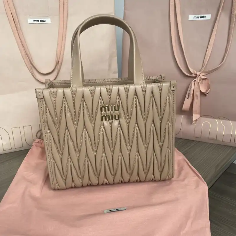 Discover the elegance of the Miu Miu Matelassé Tote in warm brown. Perfect for adding a touch of sophistication to your day! 🌟👜✨ https://tinyurl.com/2bnor6ft