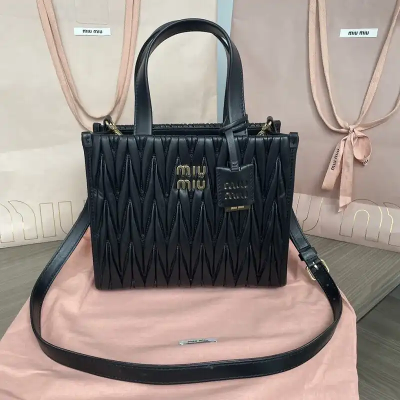 Discover the elegance of the Miu Miu Matelassé Tote in classic black. A perfect blend of style and charm! 🖤✨👜 https://tinyurl.com/25uopv4g