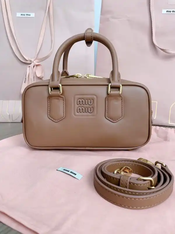 Discover the Miu Miu Arcadie Small in a warm brown hue, a perfect blend of elegance and charm. 🍂✨💖 https://tinyurl.com/285zlpxq