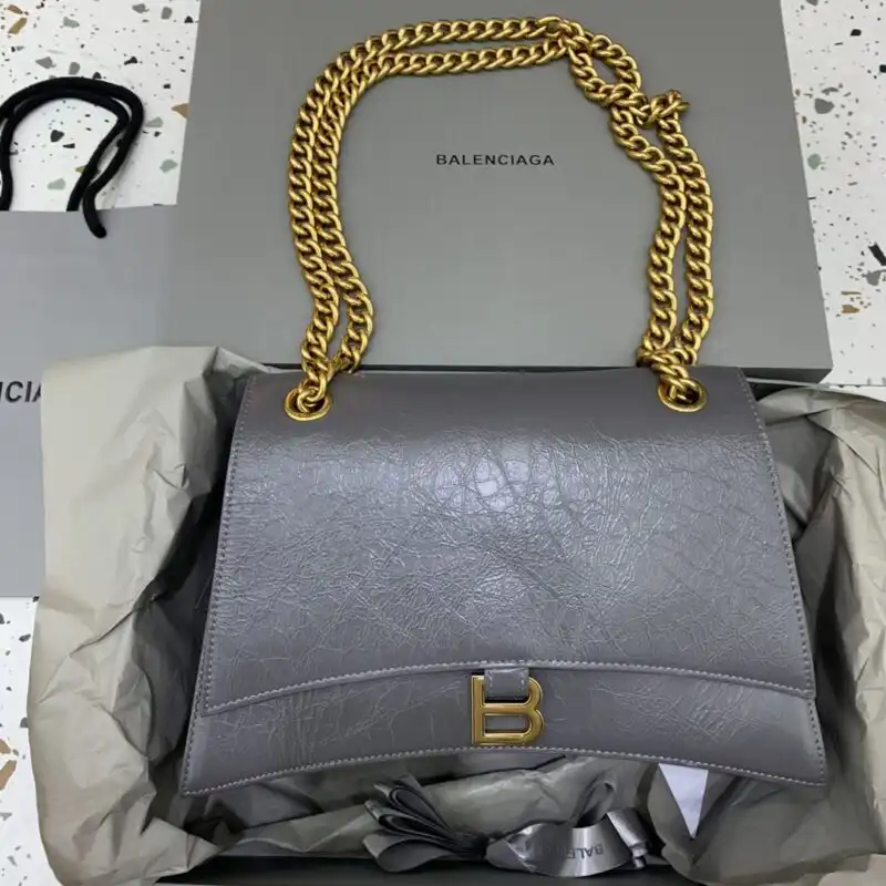 Discover the elegance of the Balenciaga Crush Large in soft grey. A timeless piece that adds charm to any outfit. 💖👜✨ https://tinyurl.com/254s778c