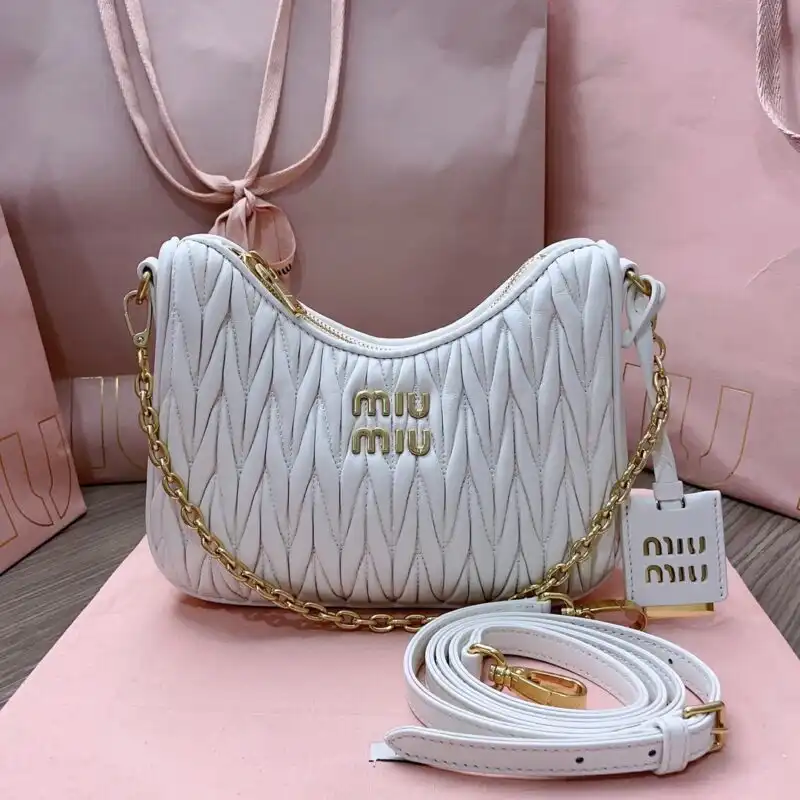 Discover the elegance of Miu Miu Matelassé White ✨🌸 A timeless piece that adds a touch of grace to every outfit. 💖 https://tinyurl.com/2cb9osul