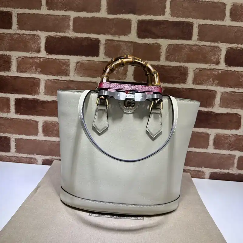 Elevate your style with the elegant Gucci Diana Medium Tote Bag in white. A timeless companion for your everyday adventures! 💖👜✨ https://tinyurl.com/27vd3ujw