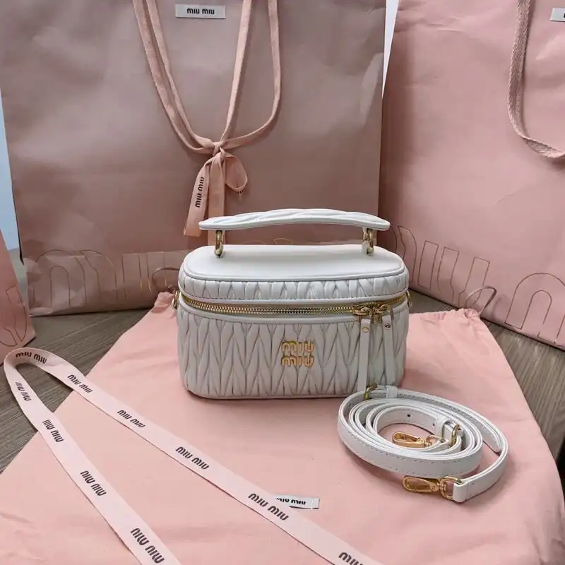 Discover the elegance of the Miu Miu Cosmetic Bag in pristine white. Perfect for keeping your essentials organized with a touch of charm! ✨👜💖 https://tinyurl.com/2a7fmlry