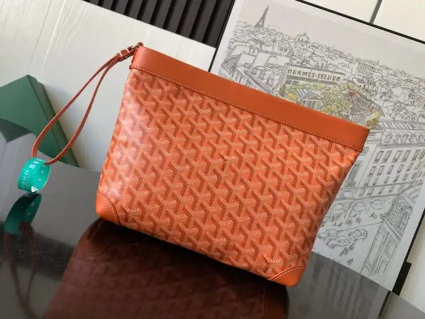 Discover the elegance of the Goyard Conti Pouch in vibrant orange! Perfect for adding a pop of color to your day. 🍊✨👜 https://tinyurl.com/234uo6w4