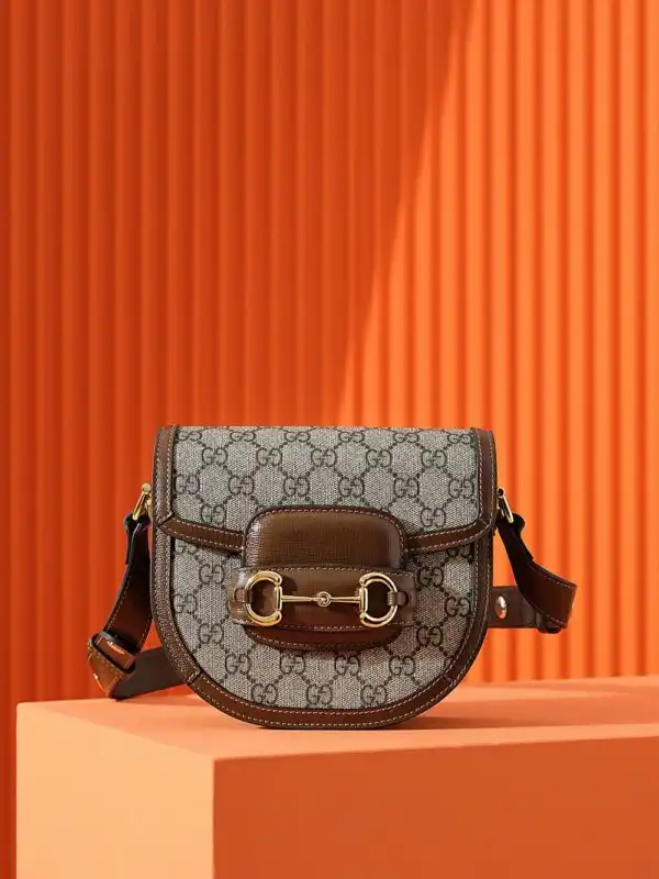 Discover timeless elegance with the Gucci Horsebit 1995 Semi-Circular Canvas. A perfect blend of style and charm. 🌟👜✨ https://tinyurl.com/27bo4cdw