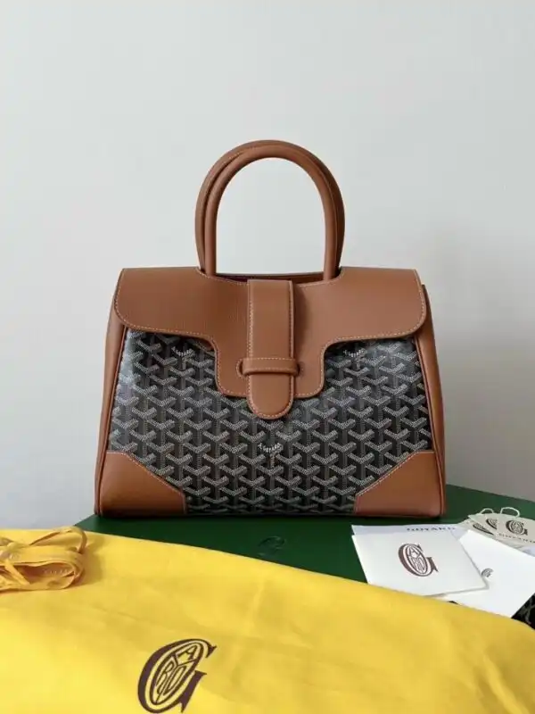 Discover the timeless elegance of the Goyard Saigon Tote in rich brown. Perfect for any occasion, it adds a touch of sophistication. ✨👜❤️ https://tinyurl.com/2xhzlby3