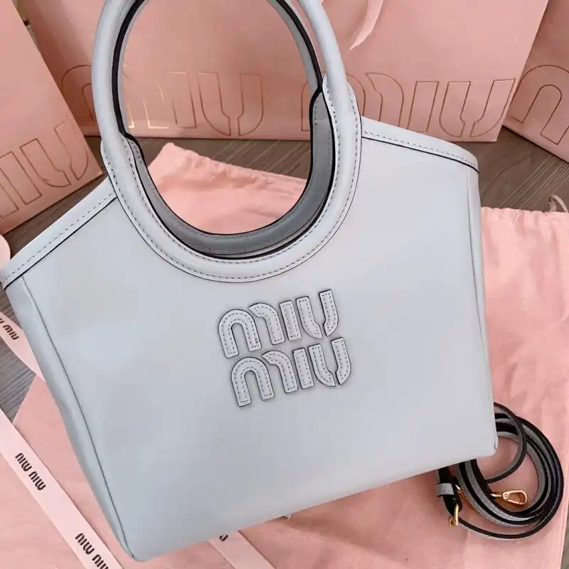 Introducing the Miu Miu Ivy Small Tote in white—a charming blend of elegance and joy, perfect for your everyday adventures! 👜✨💖 https://tinyurl.com/28zq2xb6