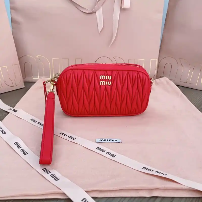Discover elegance with the Miu Miu Clutch in a stunning red hue. A perfect companion for your special moments! ❤️✨ https://tinyurl.com/2as39zfk