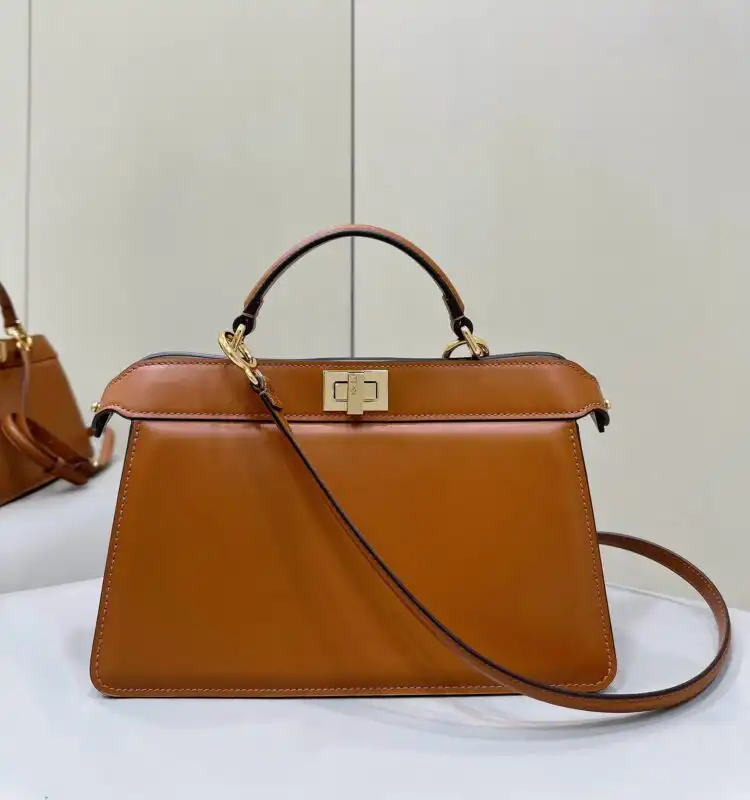 Discover the elegance of the Fendi Peekaboo Large in a warm brown hue. Perfect for elevating your style with grace. ✨👜💖 https://tinyurl.com/24nzaqd9