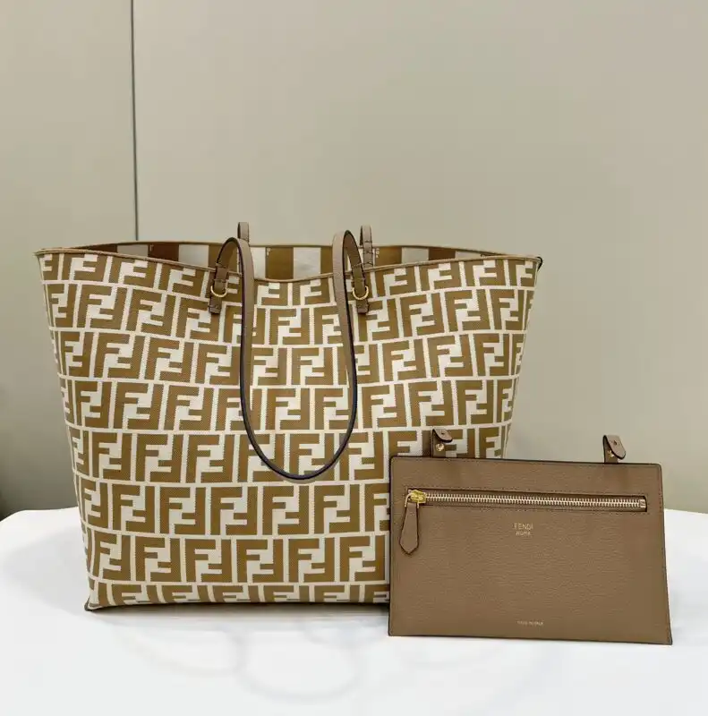 Discover elegance with the Fendi Two Side Small Tote in beige. Perfect for any occasion, it adds a touch of charm! 🌟👜✨ https://tinyurl.com/2awlxhxn