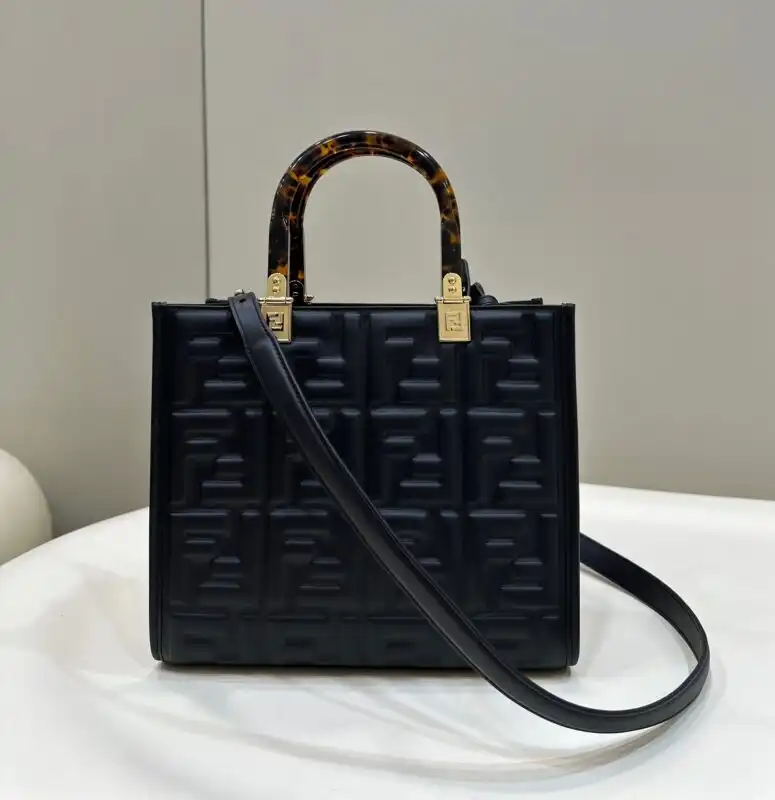 Discover elegance with the Fendi Small Tote in black. Perfectly crafted for your essentials, it adds a touch of charm to any outfit. 🖤✨👜 https://tinyurl.com/2y7wlj4j