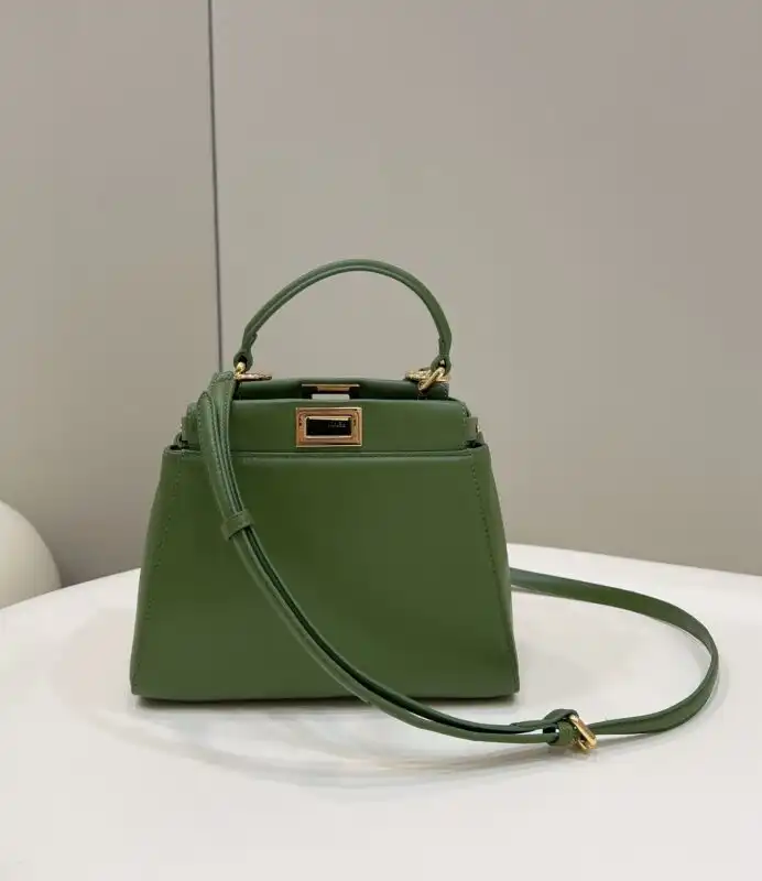 Discover elegance with the Fendi Peekaboo in a soothing green hue. A perfect companion for any occasion. 🌿💚✨ https://tinyurl.com/29bs4tf7